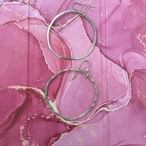Round hoop silver tone earrings